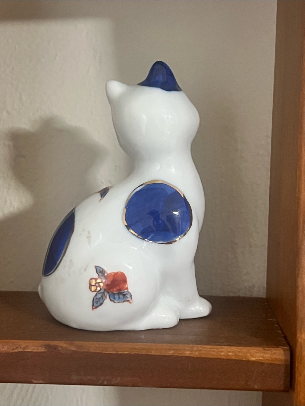 White Ceramic Cat Figurine with Blue Accents and Gold Trim - Picture 3 of 5
